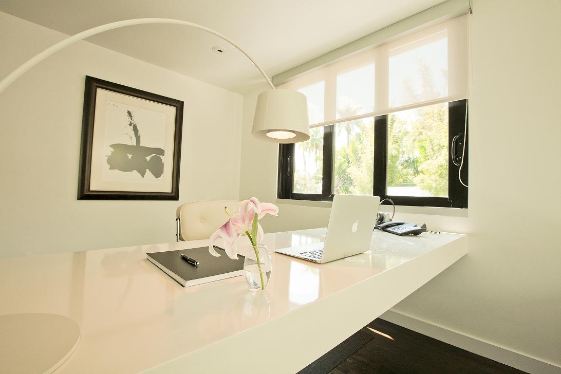 Contemporary Home Office with white leather office chair